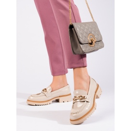 Patent beige brogues with a golden Shelovet embellishment 2