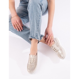 Women's leather openwork shoes on the Shelovet golden platform 1