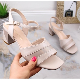 Elegant women's sandals on a beige post Sergio Leone SK897 1