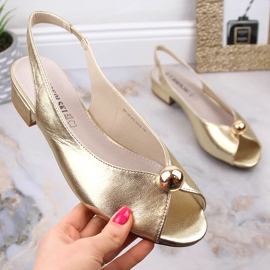 Women's flat metallic golden sandals T.Sokolski L23-435 1