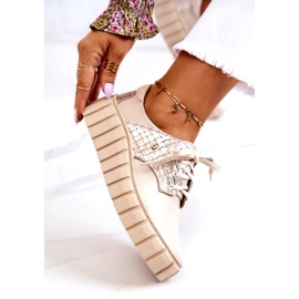 Lemar Beige and gold leather shoes on a platform 4