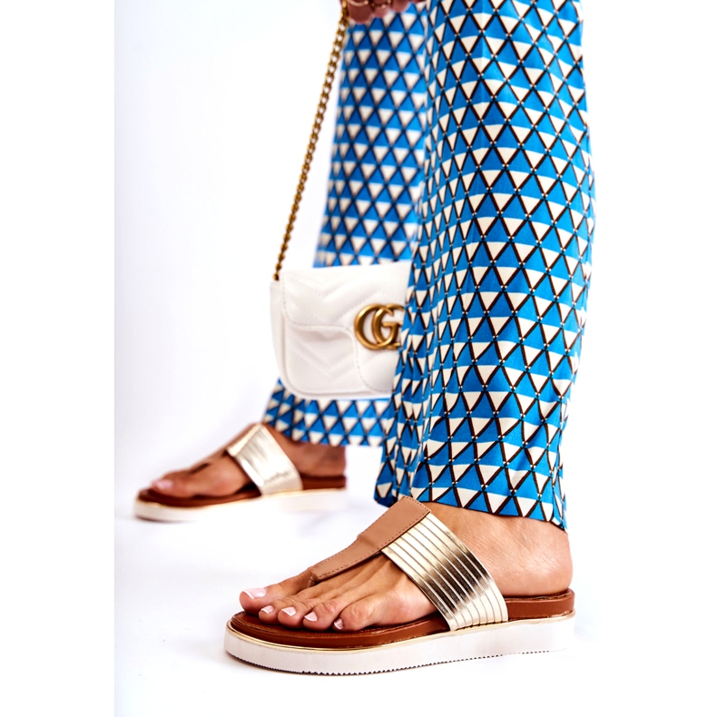 Women's flip-flops on beige-gold platform 4