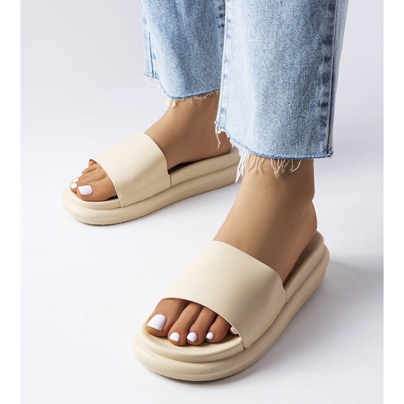 Beige slippers on the platform 1