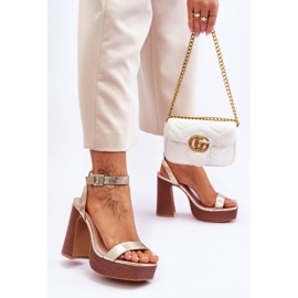 Leather Sandals On A Massive Golden Marina Platform 2