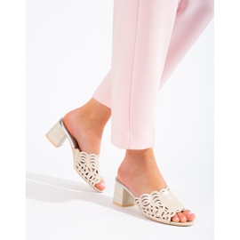 Beige openwork mules on the post from Shelovet 2