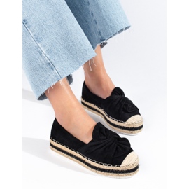 Black suede espadrilles on the platform with a bow from Shelovet 1